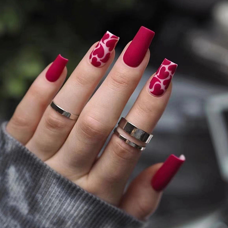 Spicy design medium long matt red color press on nail with heart shape