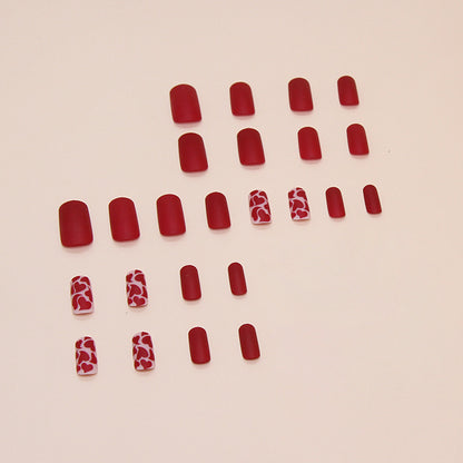 Spicy design medium long matt red color press on nail with heart shape